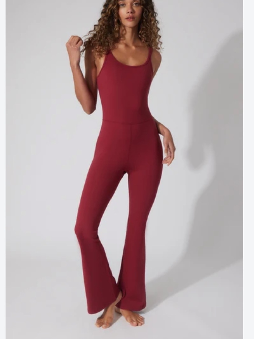 Qinsen stretchy Marion kick flare jumpsuit size medium